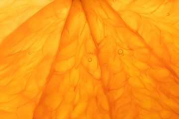 Bright juicy orange pulp close-up. High-quality image is suitable for topics: healthy lifestyle, vitamins, proper nutrition, diet, summer, fresh juices. Background fruit texture. - obrazy, fototapety, plakaty