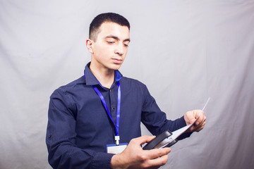Stapler pierces sheets of paper