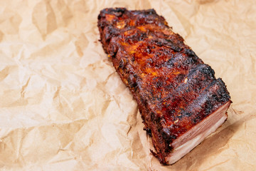Spicy hot grilled spare ribs from a summer BBQ. Paper Kraft Background