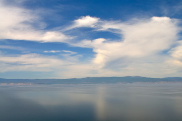 Fototapeta na wymiar Picturesque clouds at Lake Baikal in eastern Siberia - Russia