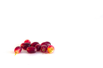 Red grapes separated and photographed against white background with space for content
