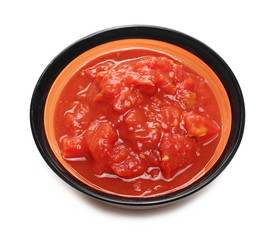 Tomato cubes, pieces organic pure texture in ceramic bowl, isolated on white background