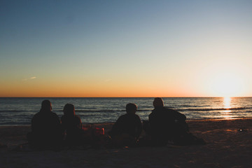 Sunset on the Beach with Friends