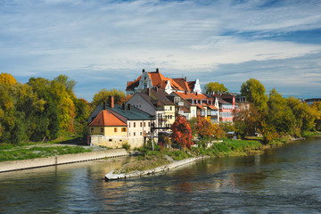 Fototapeta na wymiar Old houses along Danube River in Regensburg, Bavaria, Germany