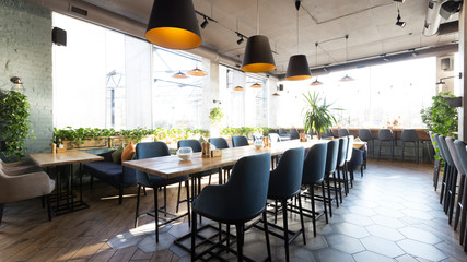 Empty restaurant interior while coronavirus pandemic, no people