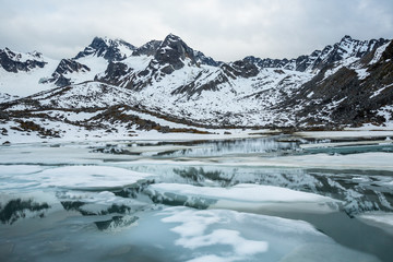 Spring thaw on a backcountry lake below Montana Peak. Remote Alaskan wildernes.