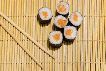 maki rolls sushi Asian cuisine tasty main stream food photography background on wooden carpet decoration