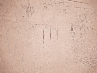 Beige background with distressed concrete wall