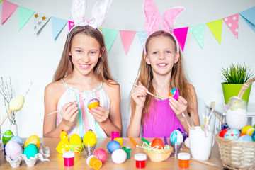 Happy easter. Beautiful little kids wearing bunny ears on Easter day.