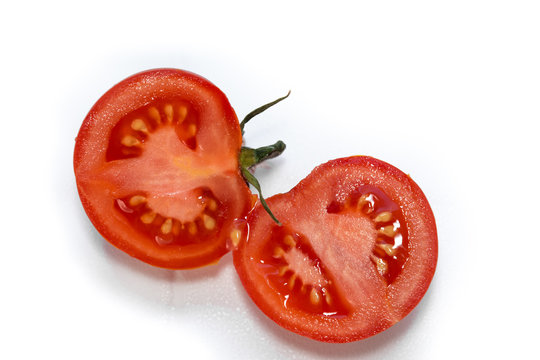tomato vegetable CUT TWO HALF natural drops white background isolate vegan vegetarian family solanaceous
