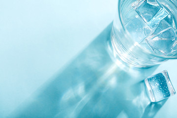 Colored banner with fresh ice cubes and reflections