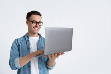 Great job concept. Guy holds laptop in hands