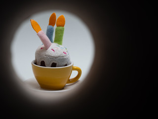 yellow coffee cup with birthday cake