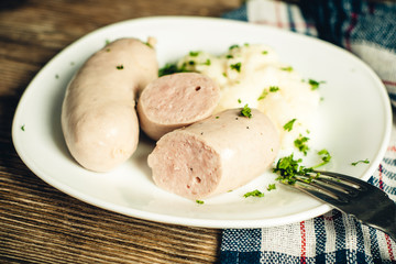 sausages with mashed potatoes on a plate