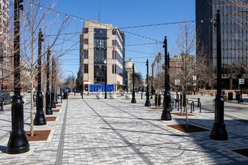 EVANSTON, IL - APRIL 3, 2020: On a normally busy work day, an empty plaza depicts the results of social distancing and home isolation during the COVID-19 pandemic. © pics721