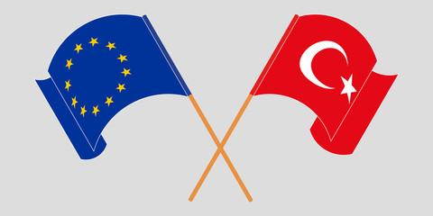 Crossed and waving flags of Turkey and the EU © valyalkin