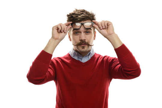 Young Funny Guy Holding His Glasses