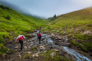 Fototapeta premium Exploring the mountains of Romania, epic landscapes and low clouds ahead