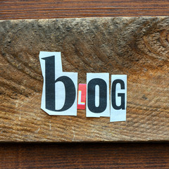 BLOG Word blog composed of letters spelled from the press on wooden background.
