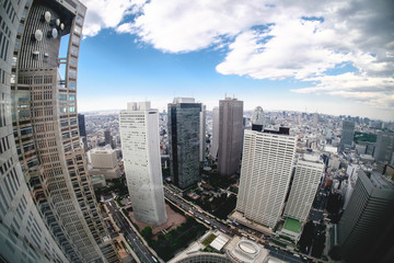Fototapeta na wymiar Tokyo downtown skyline view from Metropolitan Government Building no.1 panoramic observation deck, Shinjuku, Japan