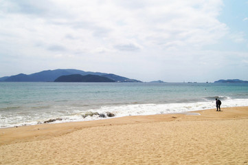 Deserted sandy shore of an Asian warm beach