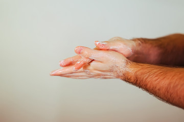 Hand washing with soap for the prevention of germs, bacteria, viruses.