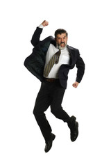 Mature hispanic businessman jumping of joy