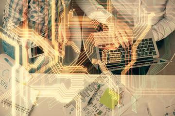Double exposure of man and woman working together and technology theme drawing. Computer background. Top View. High tech concept.