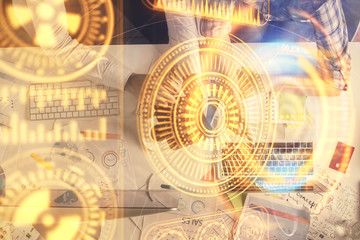 Fototapeta premium Double exposure of man and woman working together and technology theme drawing. Computer background. Top View. High tech concept.
