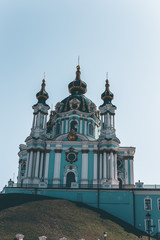 Fototapeta na wymiar St. Andrew's Church on Andreevsky descent on the hem in the historical center of Kiev