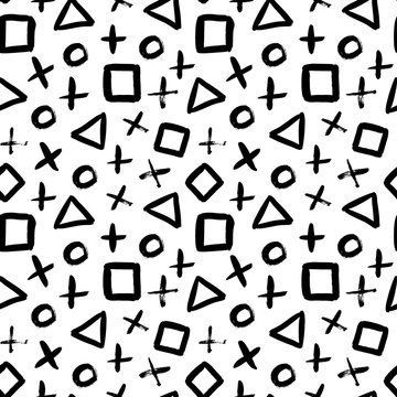 Geometric vector seamless pattern in Memphis style. Grunge brush stroke triangles, circles, crosses and squares.