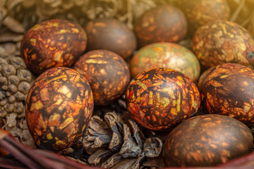 Colored Easter eggs background in warm colors