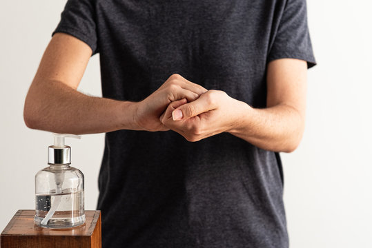 Woman's hand showing 6-steps cleaning hands with alcohol gel of antiseptic method to prevent COVID-19 spread