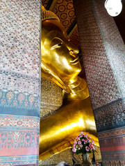 Head with eyes of the golden buddha in Bangkok