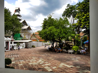 Through a frame in the backyard of wat pho in Bangkok