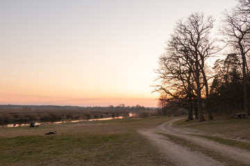 a rural country road runs off into the distance