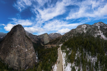 Aerial Panoramic View of a Scenic Road in the Canadian Mountain Landscape during a cloudy springtime. Taken between Pemberton and Lillooet, BC, Canada.