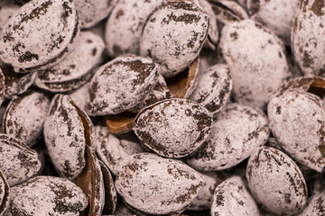 Salted apricot kernels. Selling diet products in the store.