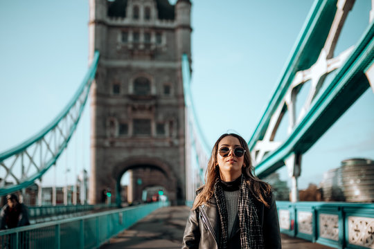 Girl Walking On Tower Bridge On A Beautiful Blue Sky Day