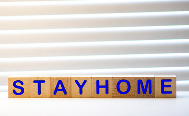 Stay home, stayhome, popular slogan and hashtag about coronavirus COVID-19 quarantine, text on...