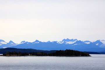 Alaska / USA - August 15, 2019: Alaska coastline view from a cruise ship deck, Alaska, USA