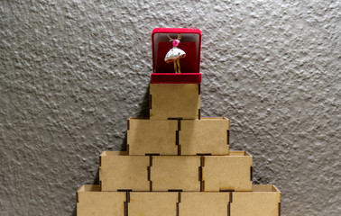 Ballerina brooch on concrete background