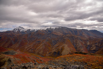 Naklejka na ściany i meble The epic & amazing mountains of Tombstone Territorial Park in northern Canada, Yukon Terrtiory. Taken in the autumn fall, just as the first snowfall happened. 