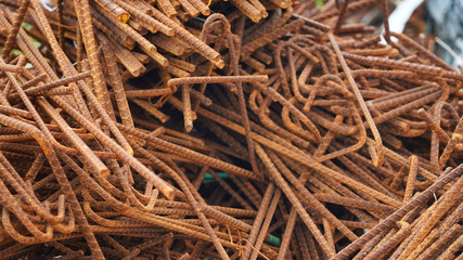 
dump of rusty metal. metal structures and scrap metal texture. non-ferrous scrap in rust under the open sky. metal processing ecology and industry