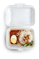 Nasi lemak in styrofoam box isolated on white with clipping path