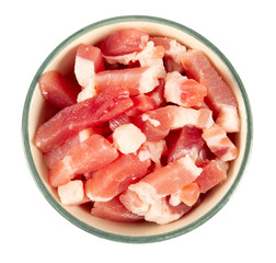 pieces of bacon in a bowl isolated on white