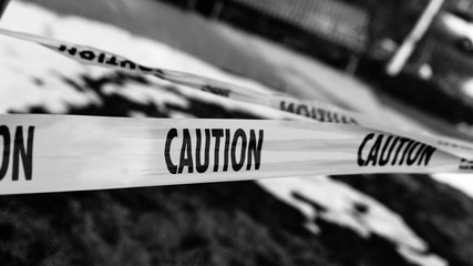 Public parks, city amenities, and playgrounds closed off due to Covid-19. Caution tape close up...