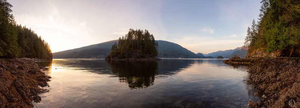 Beautiful Panoramic View of the Canadian Landscape during a vibrant winter sunset. Hike on Jug Island Trail in Belcarra, Vancouver, British Columbia, Canada. Nature Panorama Background © edb3_16