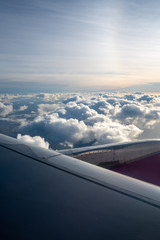 Fototapeta na wymiar View from an airplane window of clouds