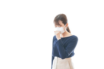 咳の症状がある若いビジネスウーマン